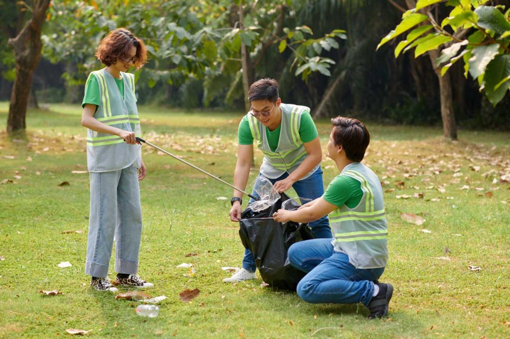 workers cleaning up a yard